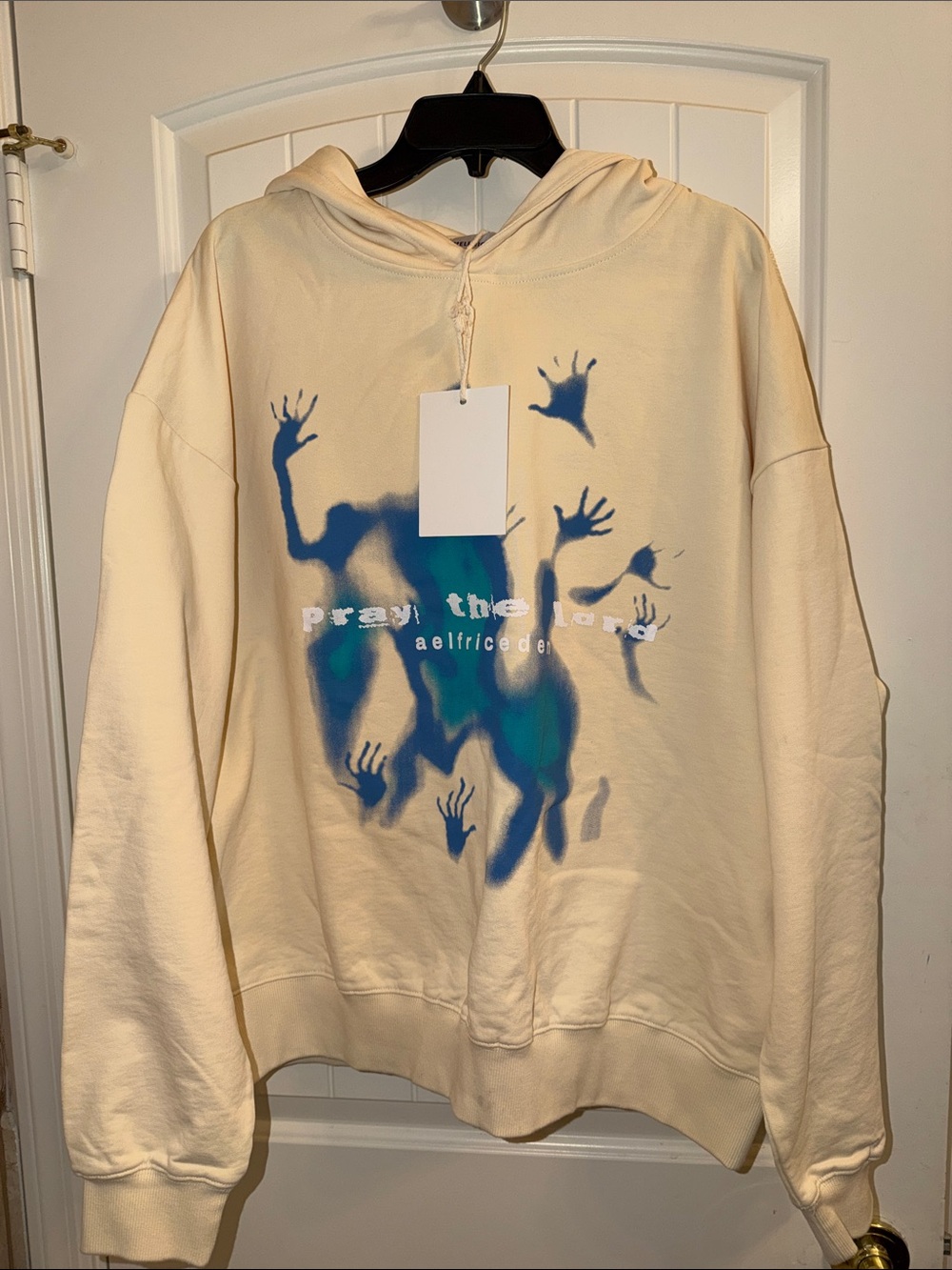 Aelfric Eden Oversized Cream Crewneck with Blue & Teal Handprint Graphic